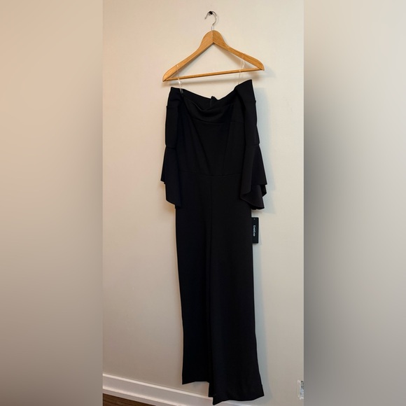 bebe Pants - NWT Bebe Black Off-Shoulder Quarter Sleeve Jumpsuit